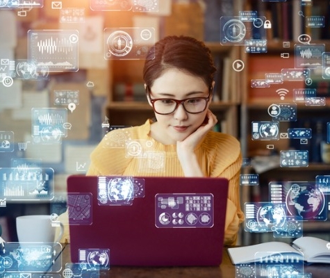 Image of young woman coding