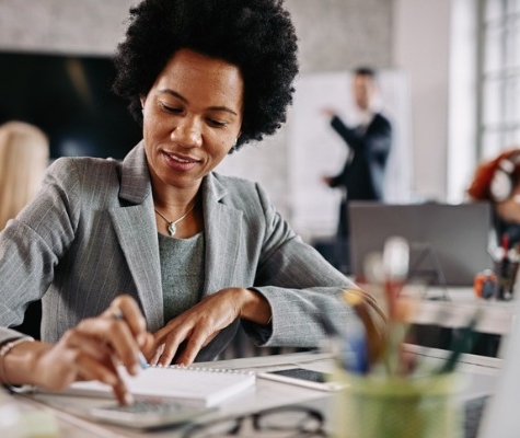 Image of business woman working at desk