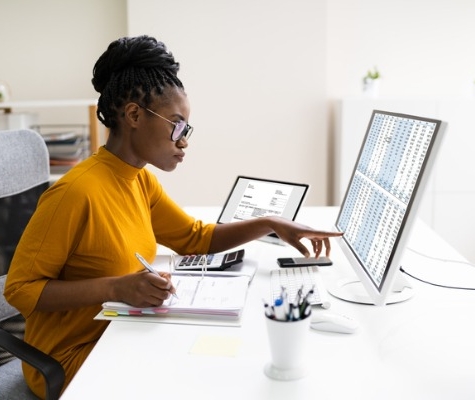 Image of woman working at desk