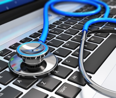 Image of Stethoscope on laptop